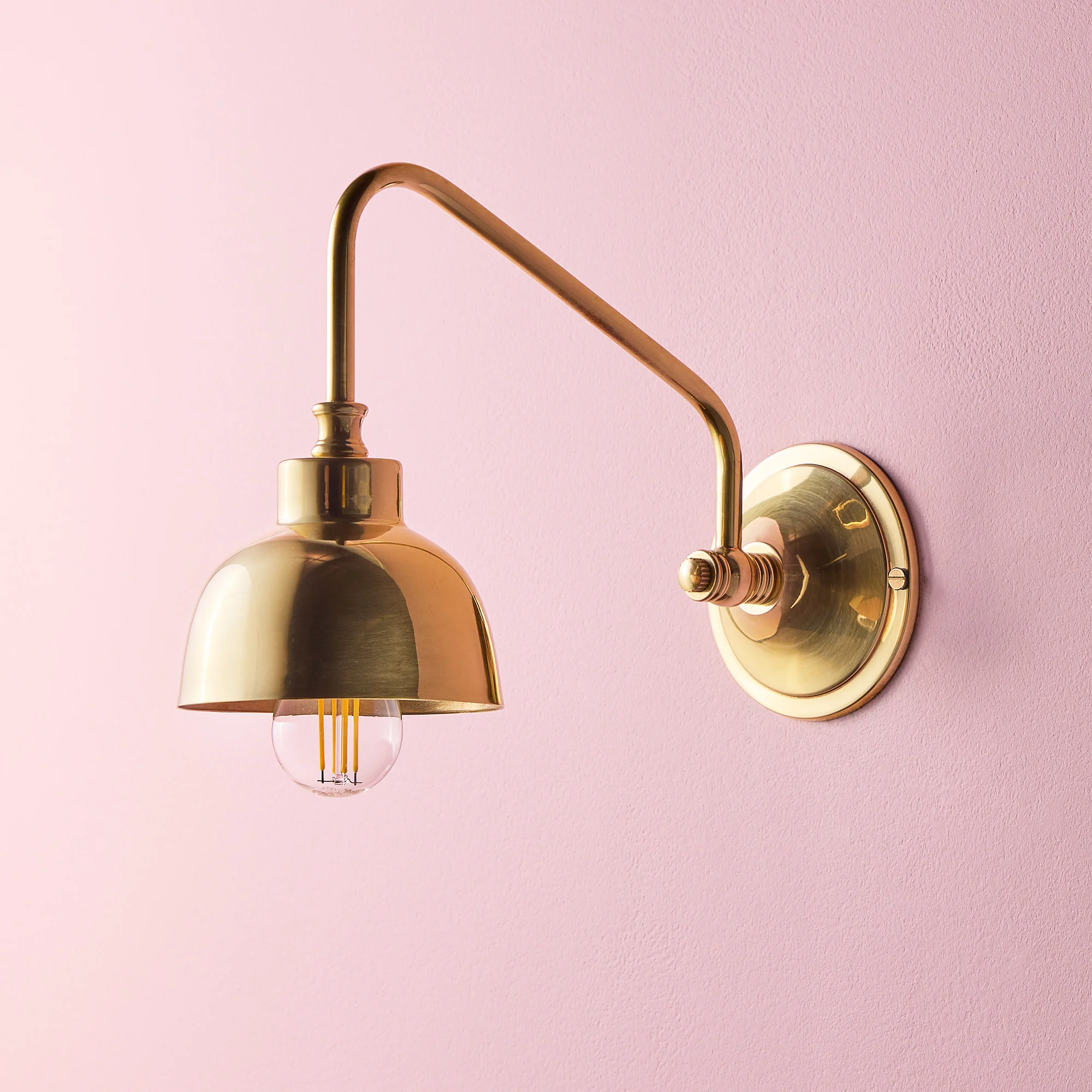 Carmel wall light in antiqued brass finish
