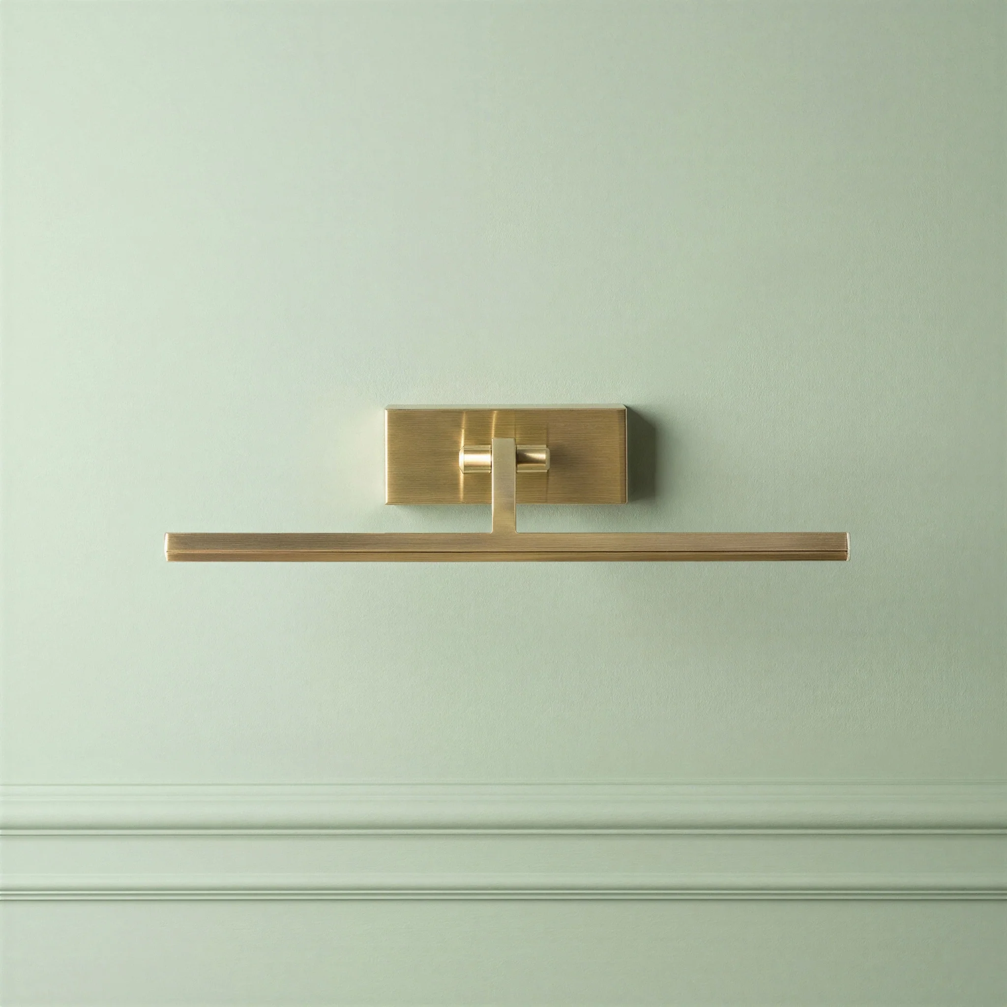 Dimmable smaller Blake picture light in antique brass finish