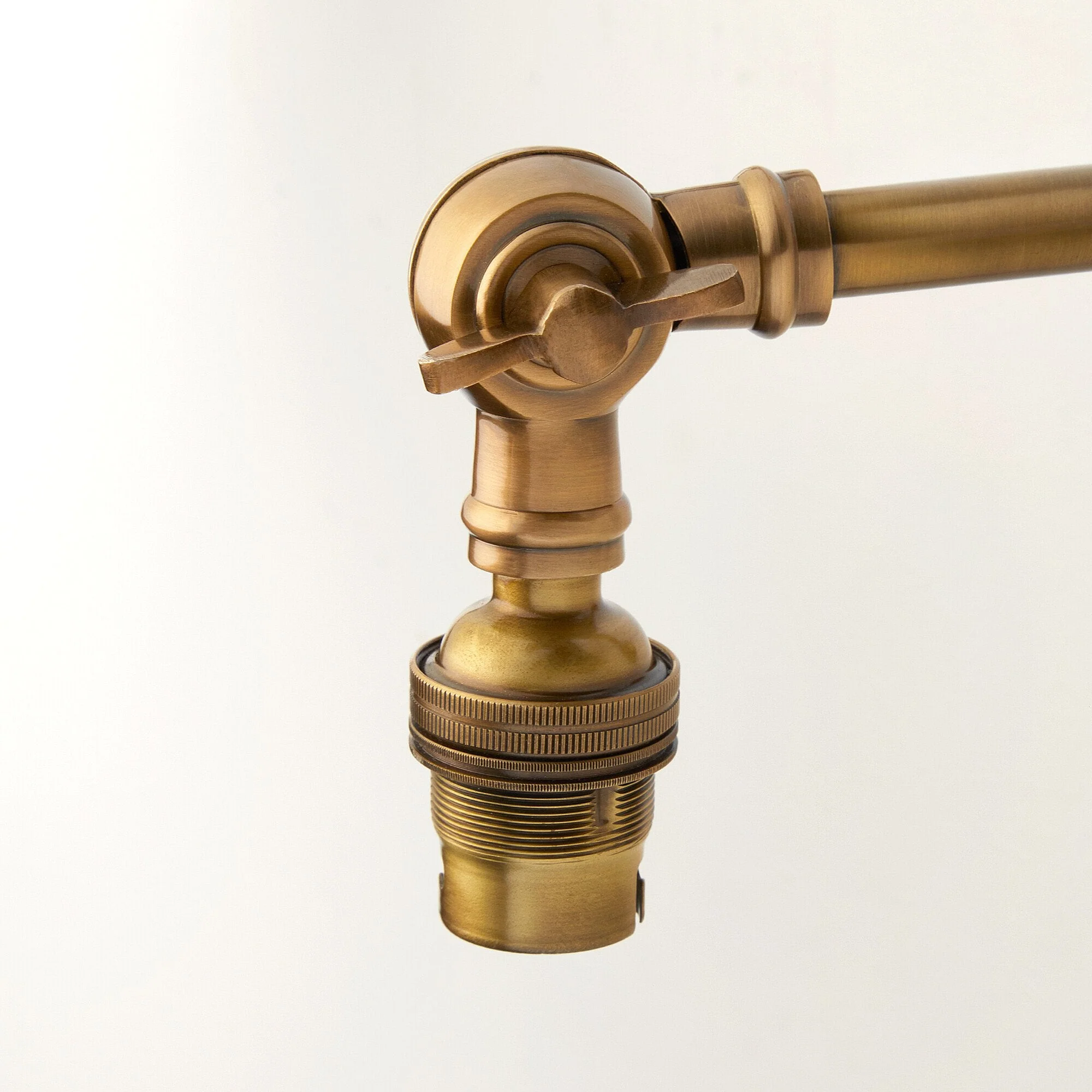 Double jointed wall fitting in antiqued brass - Image 3