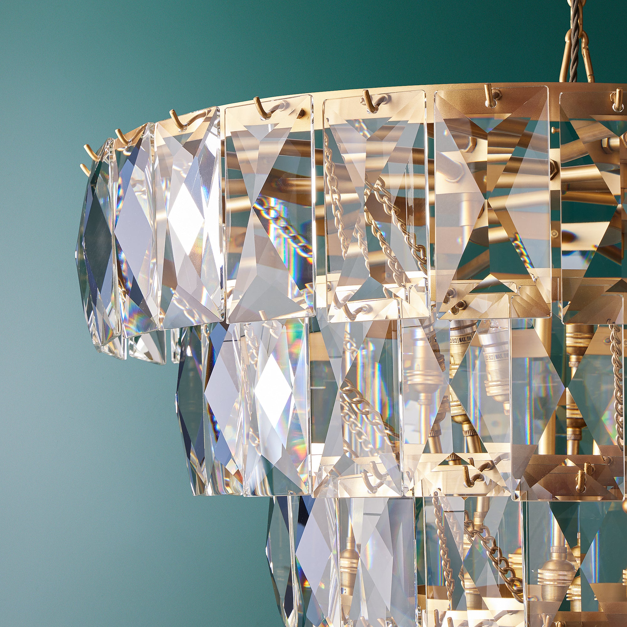 Four Tiered Conchita Chandelier in prismatic glass and brass - Image 4
