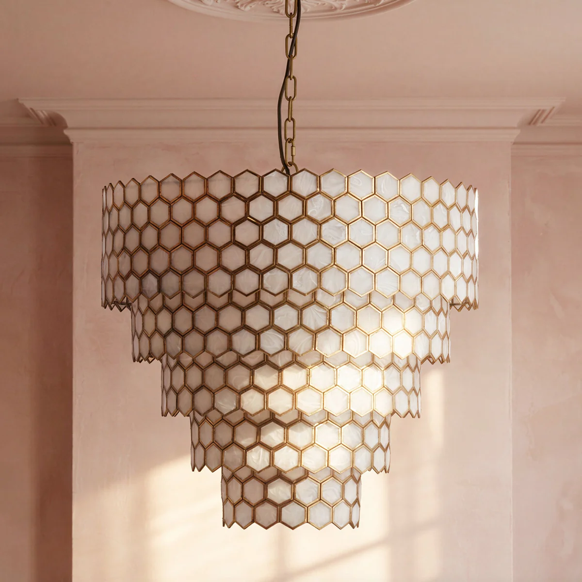 Glamazon five tier chandelier in brass and resin