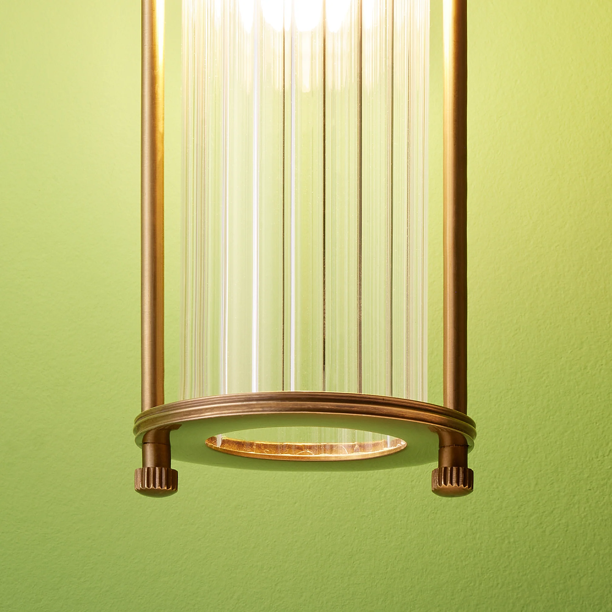 Larger Hunter IP44 rated wall light in brass and glass - Image 5