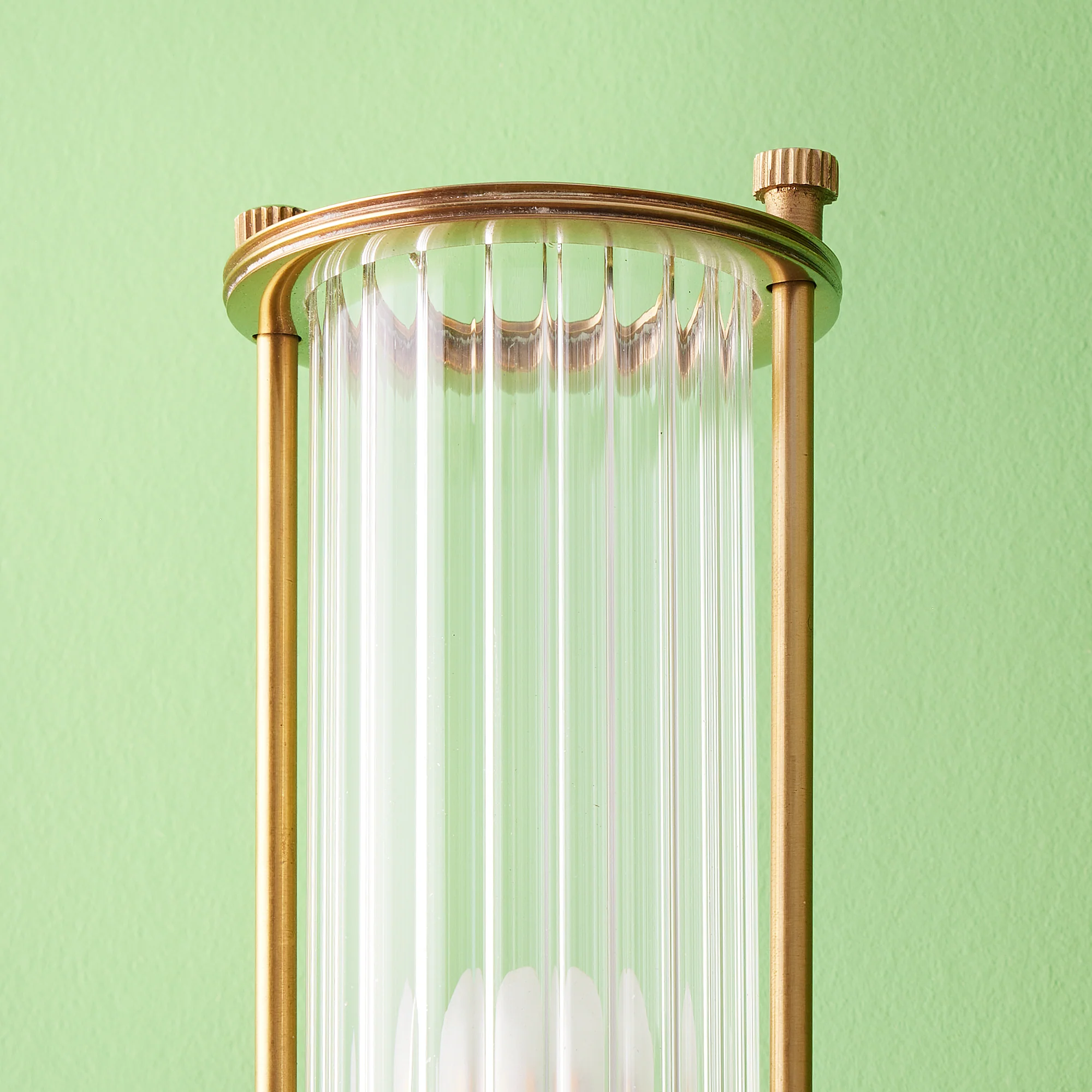 Larger Hunter IP44 rated wall light in brass and glass - Image 9
