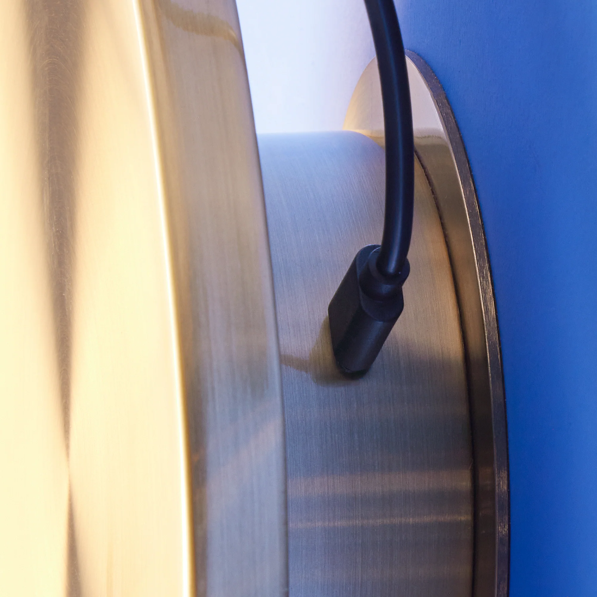 Larger Helios rechargeable wall light in brushed gold aluminium - Image 7
