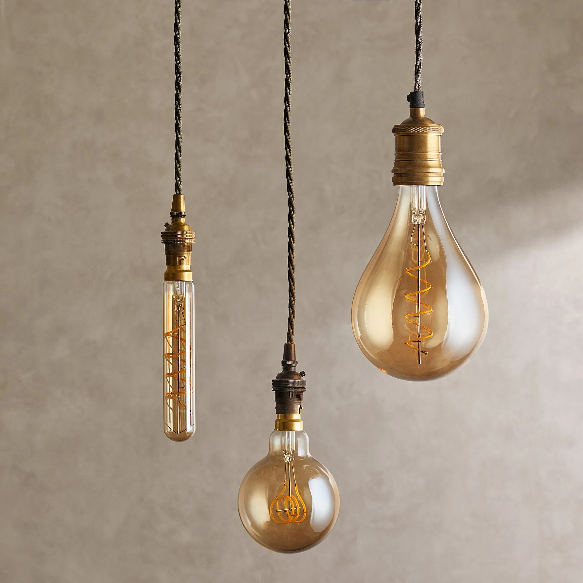 Long thin 4 watt LED curled filament bulb with amber coating and E27 fitting - Image 5