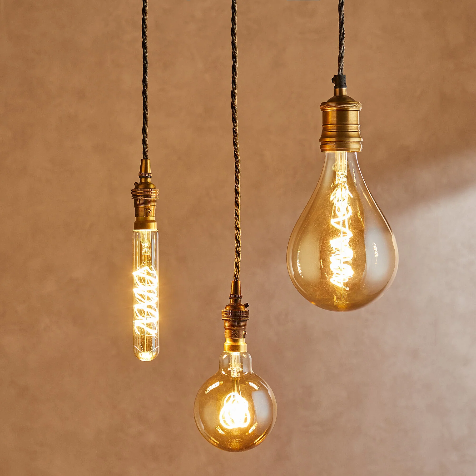 Long thin 4 watt LED curled filament bulb with amber coating and E27 fitting - Image 6