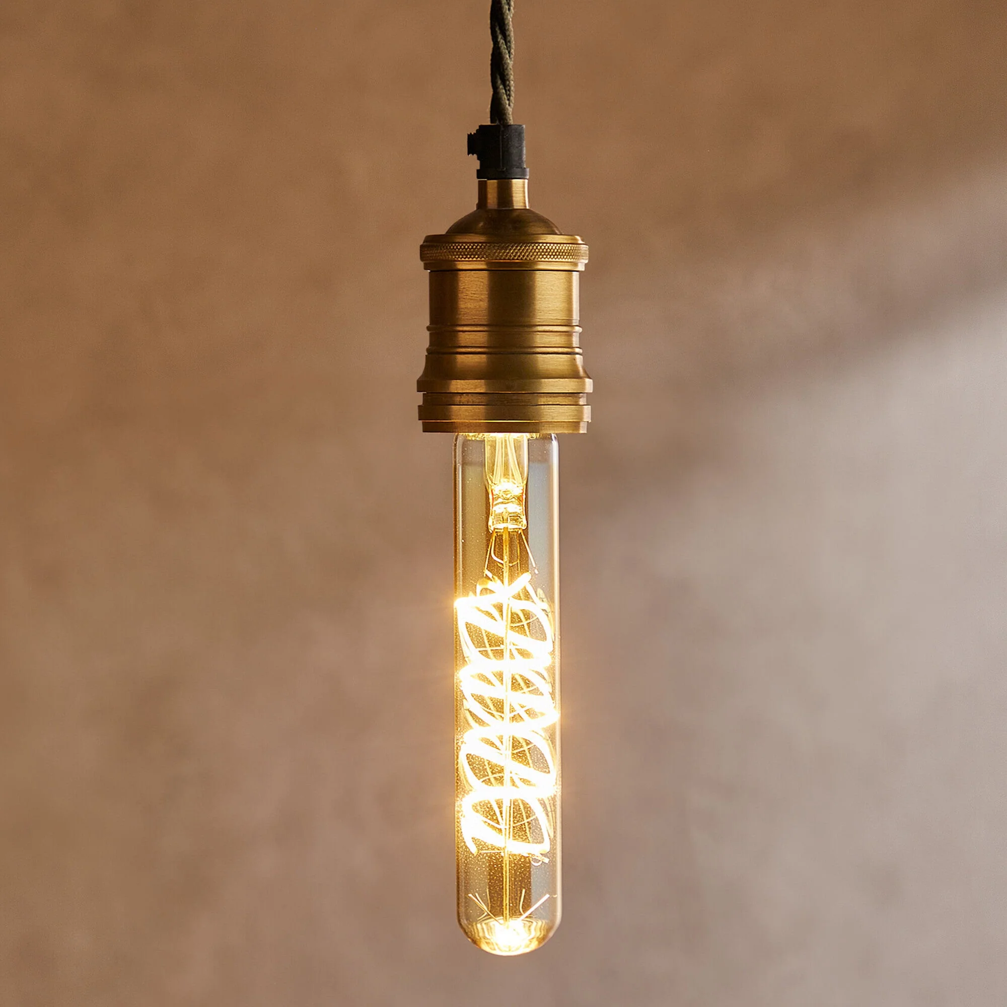 Long thin 4 watt LED curled filament bulb with amber coating and E27 fitting - Image 7