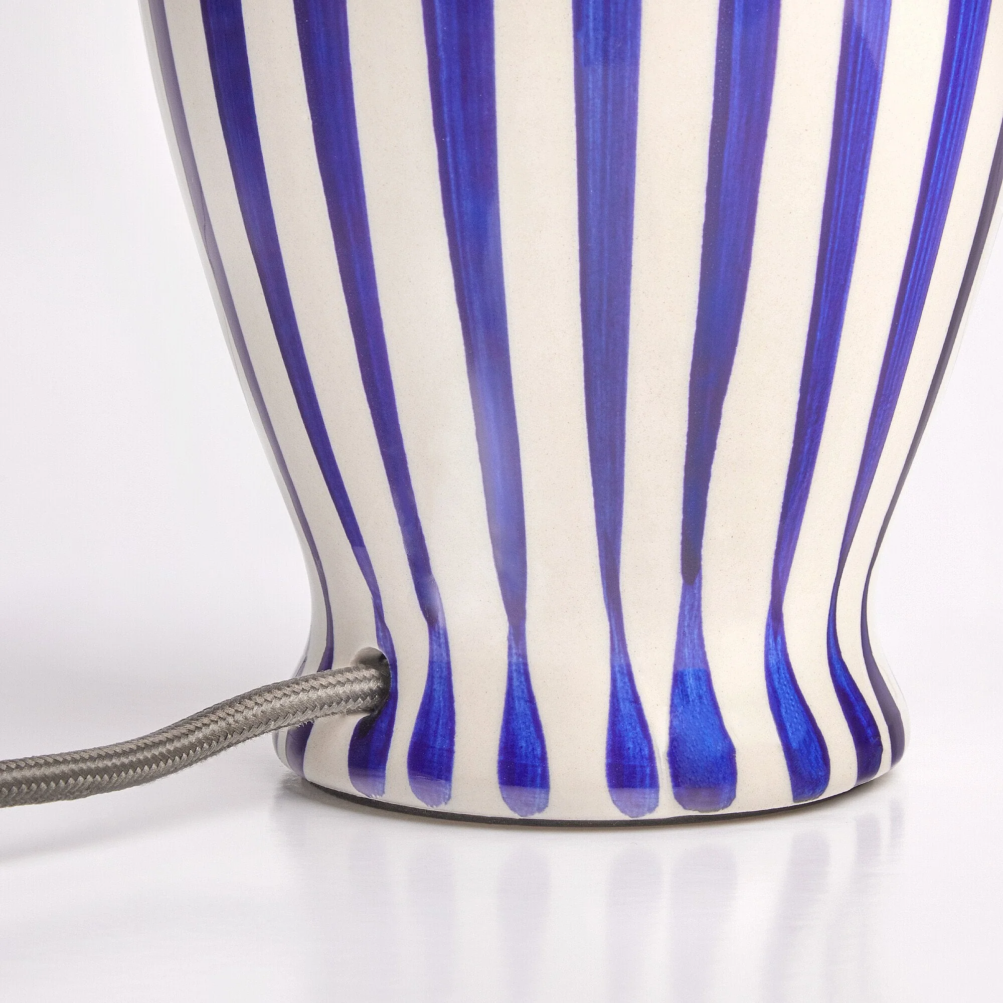 Smaller Lottie bedside lamp in a cobalt blue and stone glaze - Image 14
