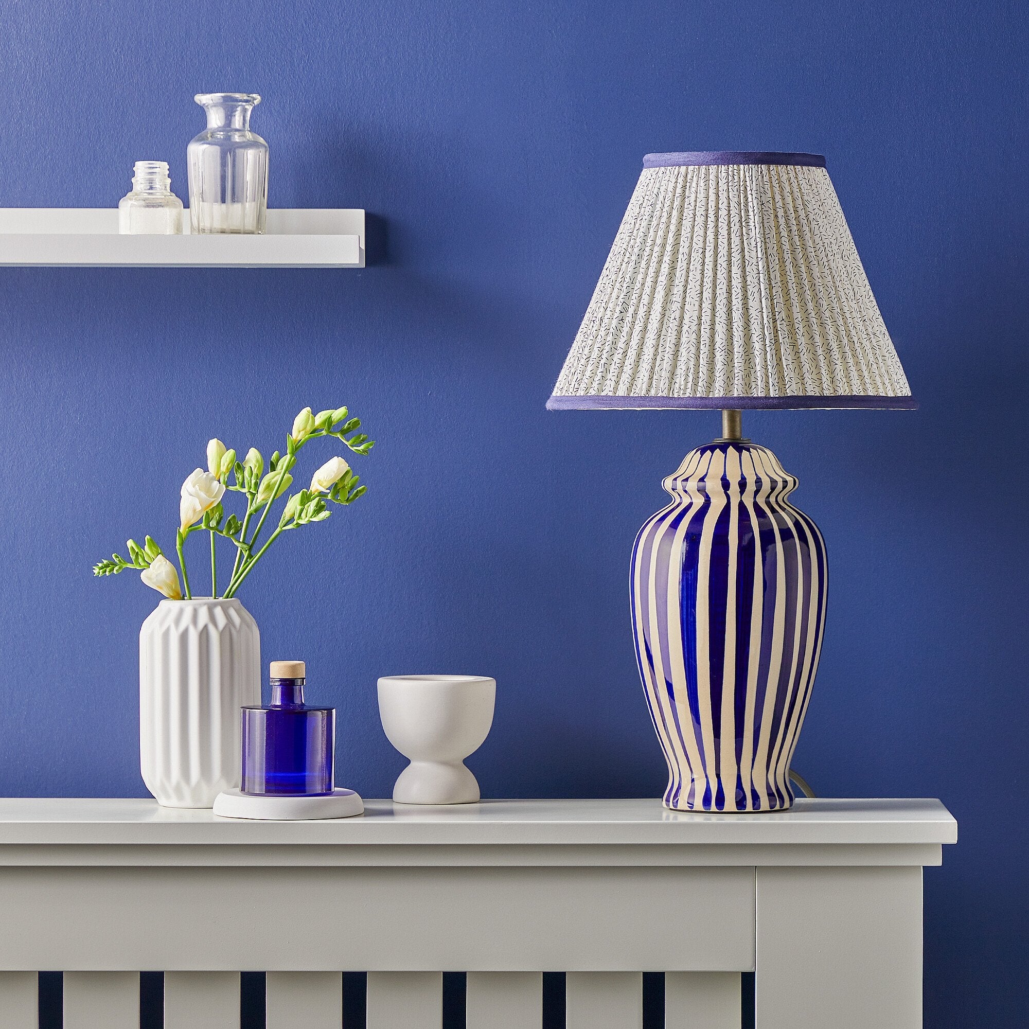 Smaller Lottie bedside lamp in a cobalt blue and stone glaze - Image 7