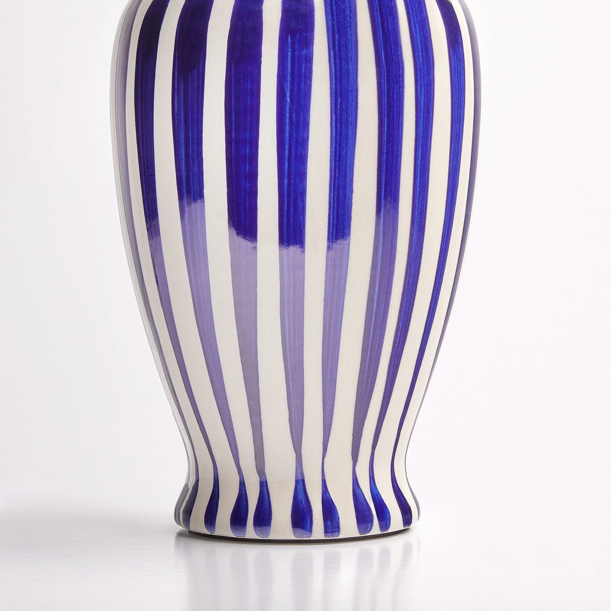 Smaller Lottie bedside lamp in a cobalt blue and stone glaze - Image 8