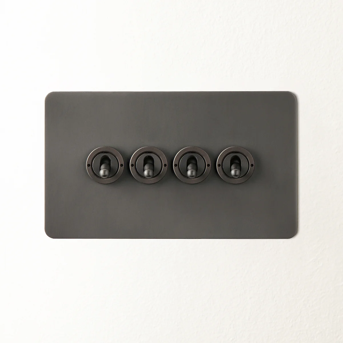 Lucian four gang 2 way toggle switch in bronze