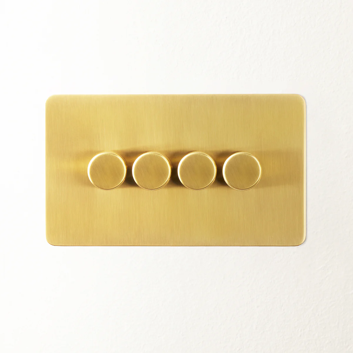 Lucian four gang dimmer switch in top brass