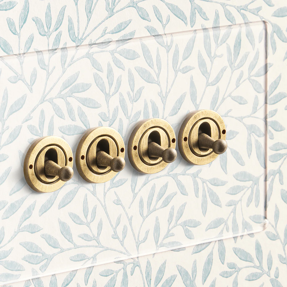 Lucian perspex four gang 2-way toggle switch in clear perspex and aged brass - Image 3