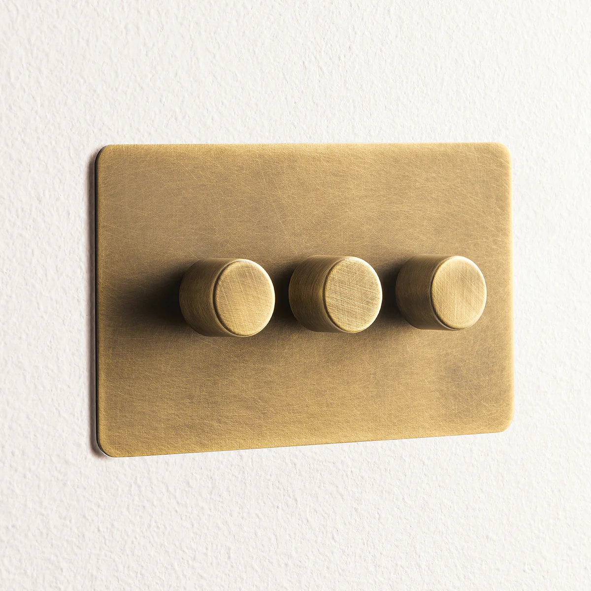 Lucian three gang dimmer switch in aged brass - Image 2