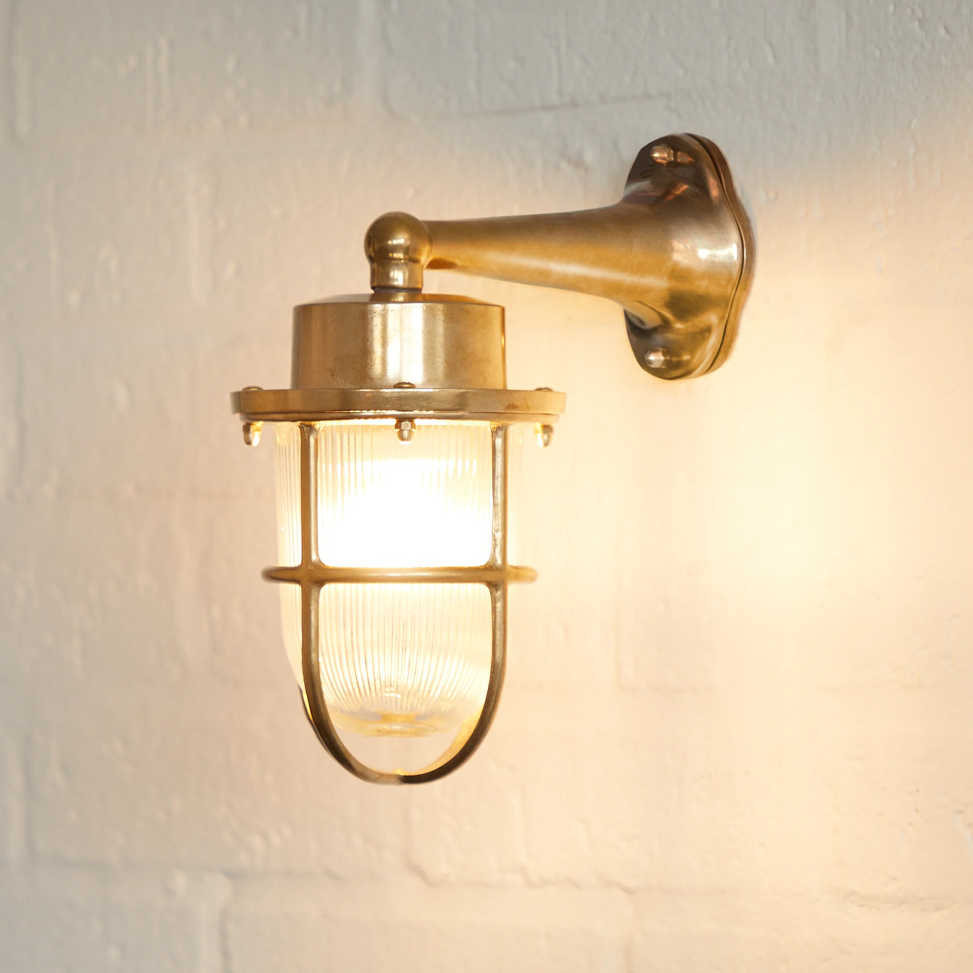 Magellan ip64 wall mounted sconce in unlacquered natural brass - Image 2