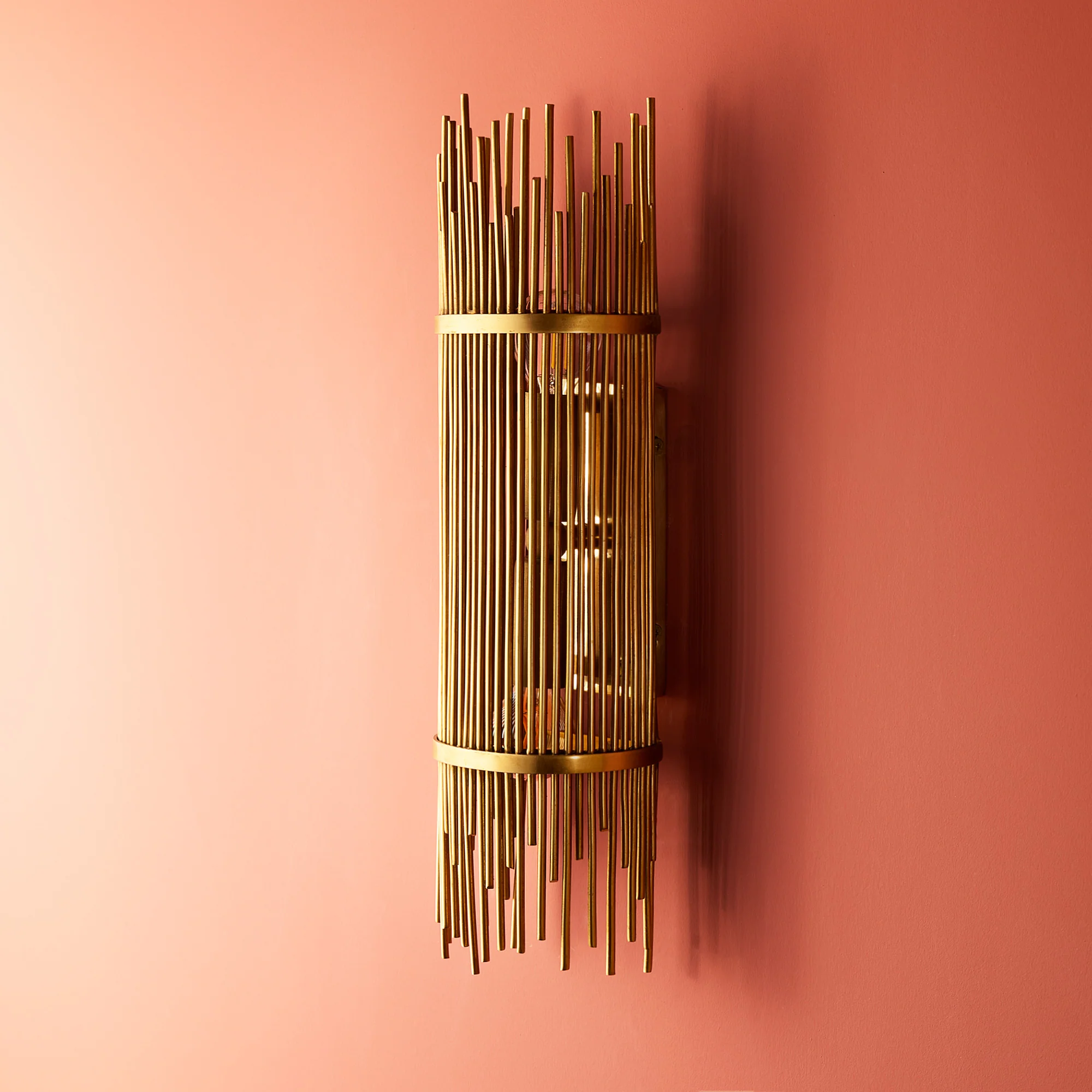 Mika wall light in antique brass