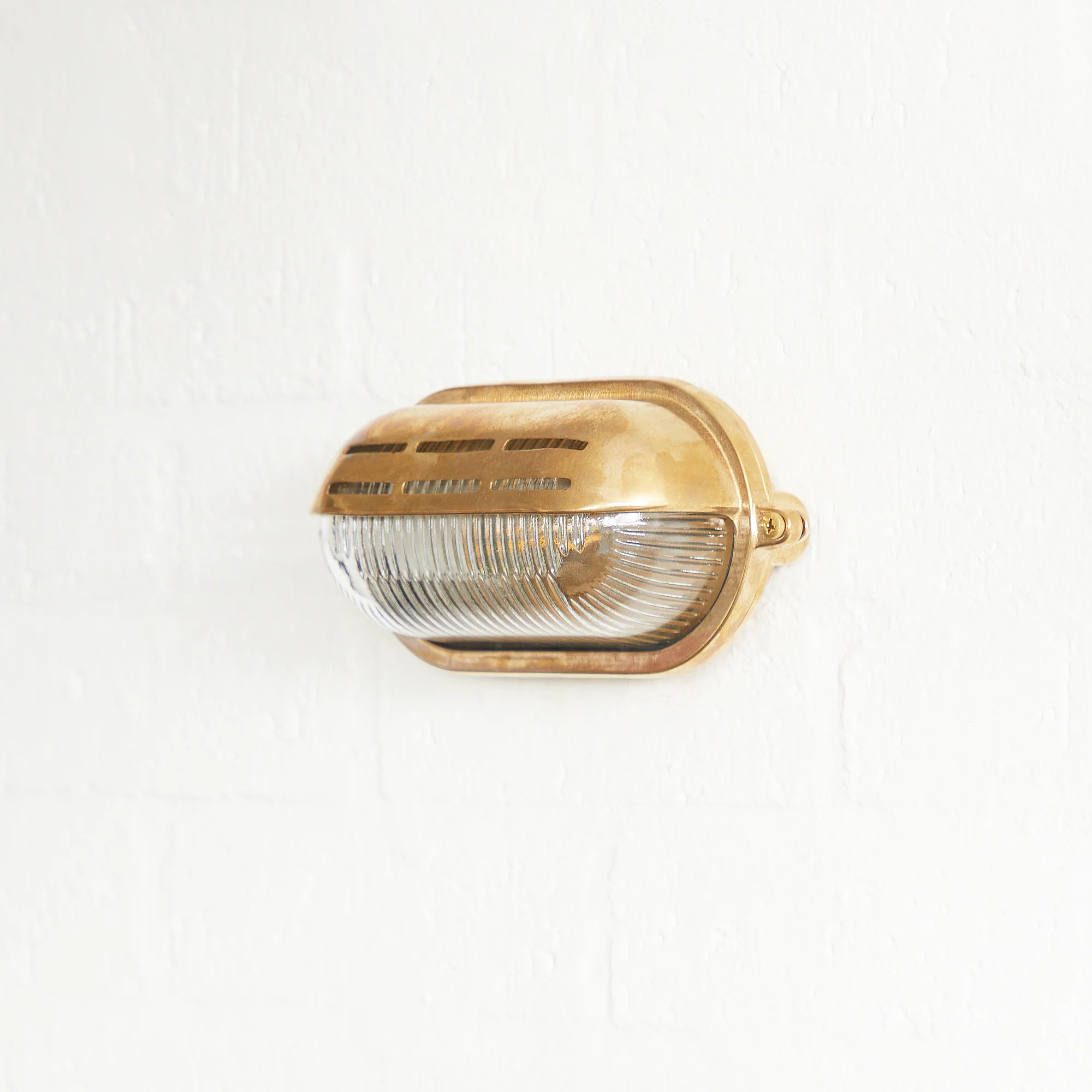 Rackham ip64 bulkhead in unlacquered natural brass