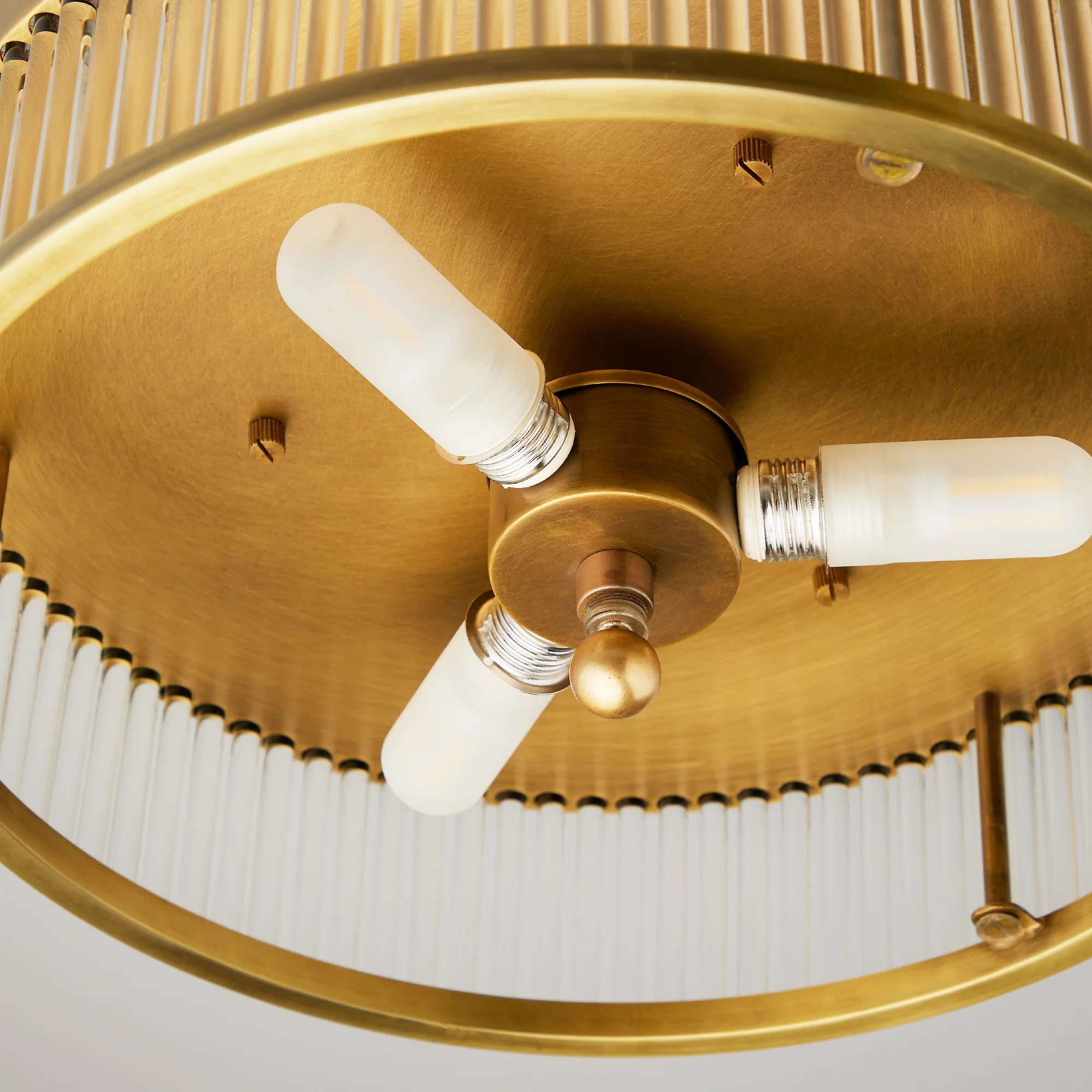 Round Roddy IP44 flush ceiling light in antique brass and clear glass - Image 11