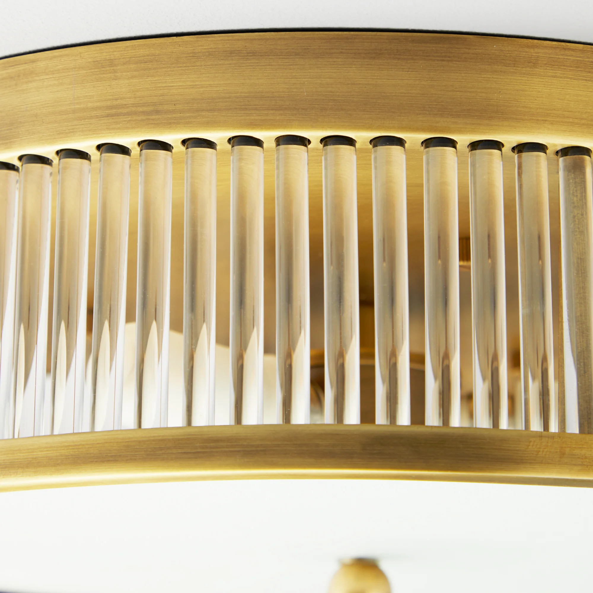 Round Roddy IP44 flush ceiling light in antique brass and clear glass - Image 4
