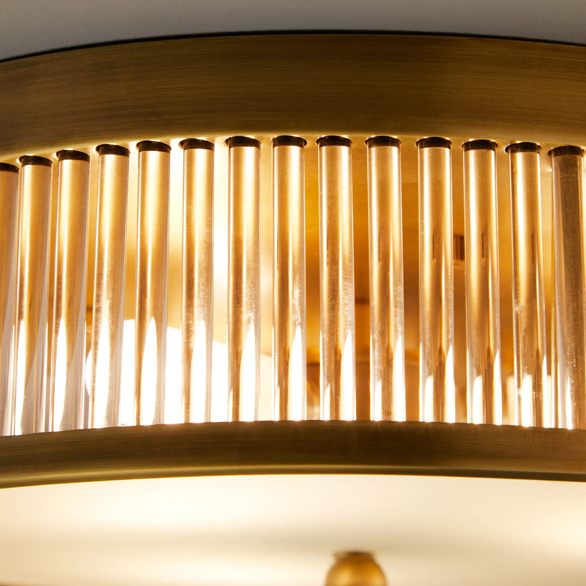 Round Roddy IP44 flush ceiling light in antique brass and clear glass - Image 5
