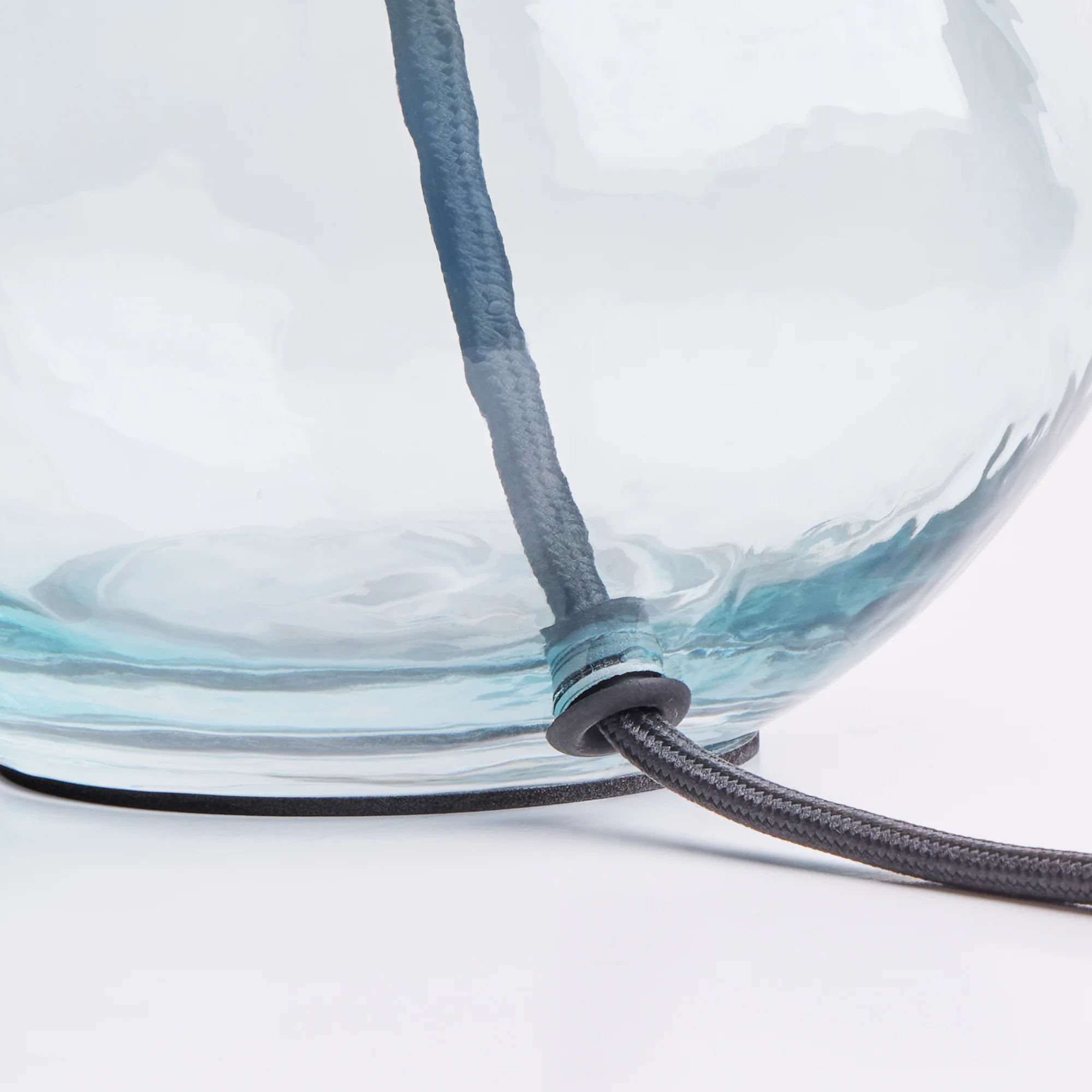 Smaller Wobble bottle table lamp in blue hammered glass - Image 2