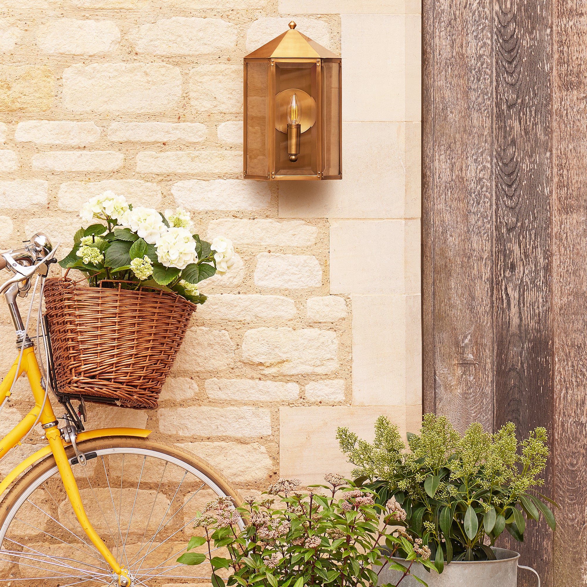 St Ives IP44 exterior wall light with brass reflector in antique brass - Image 3