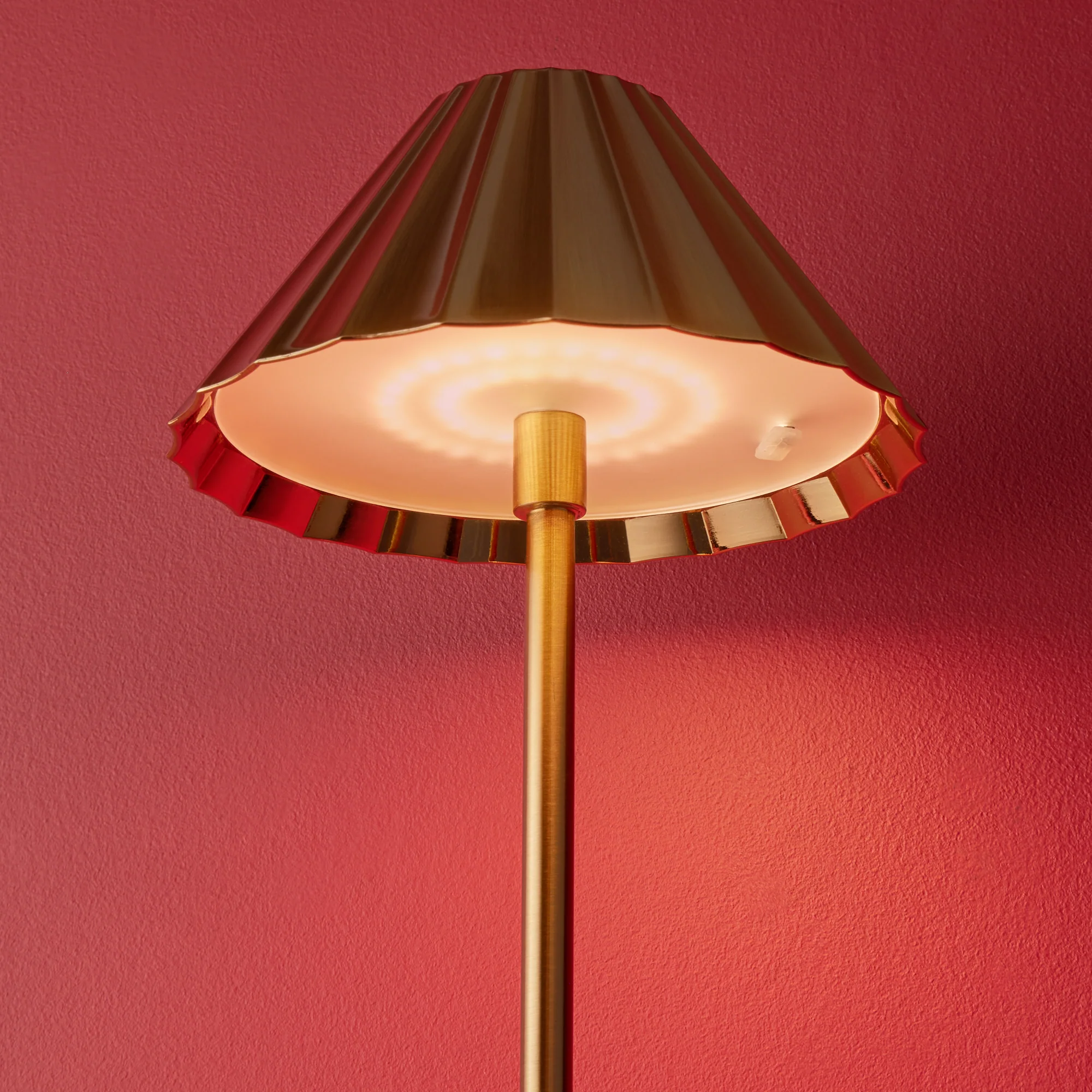 Larger Twinky rechargeable wall light in antique brass - Image 9