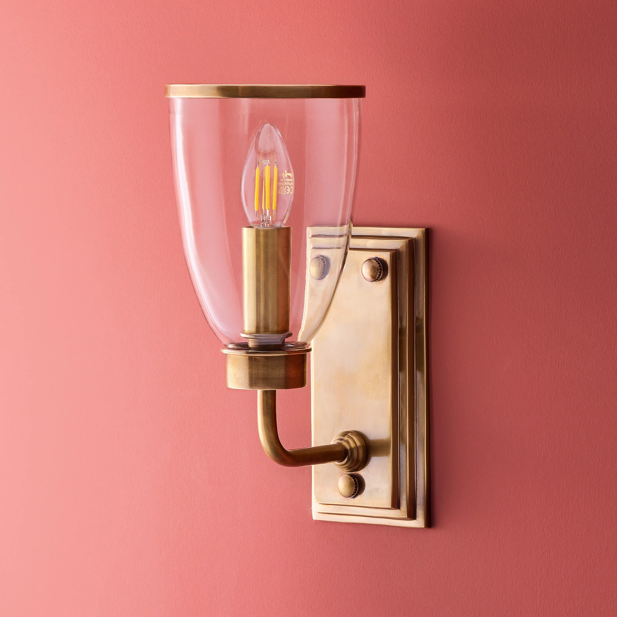 Waterloo wall light in antiqued brass